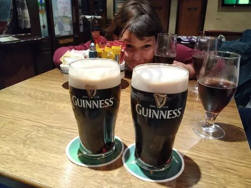 Two perfectly poured pints of Guinness